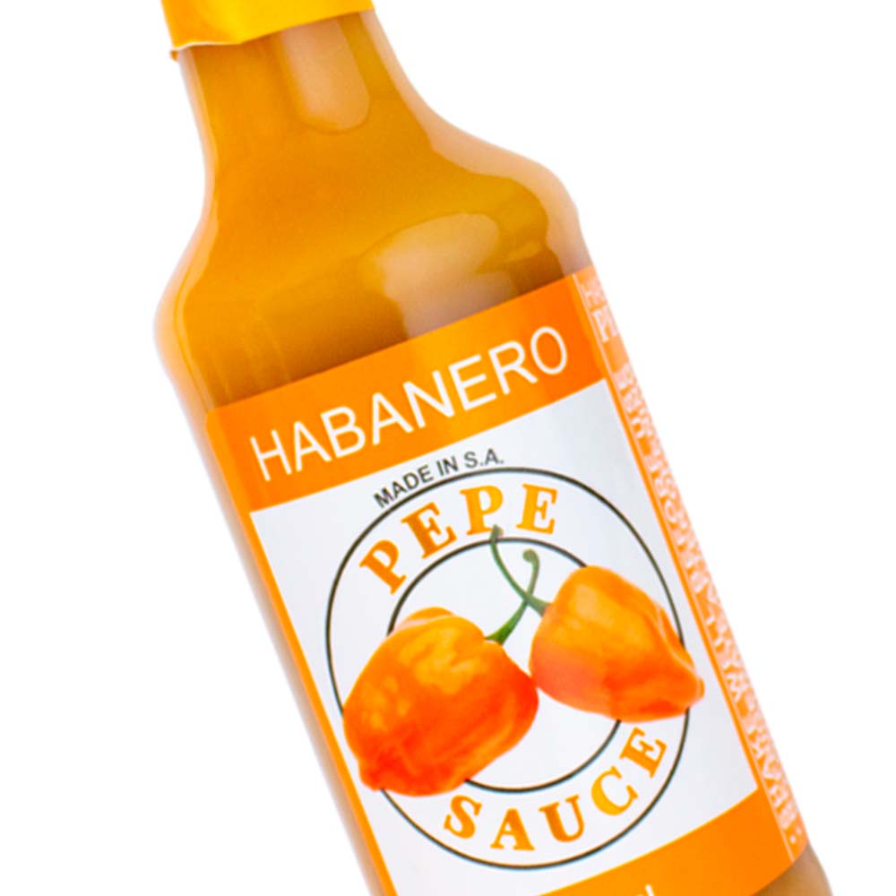 pepe habanero zoom sml Pepe Sauce - Habanero - fiery habanero hot sauce with bold fruity heat. Close up.