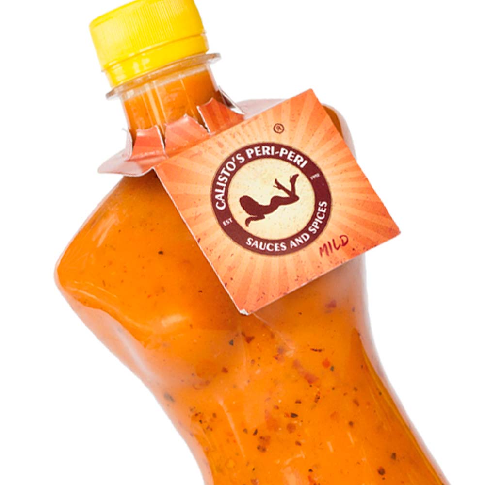 senhoritamild zoom sml Calisto’s Senhorita Peri-Peri Sauce - Mild - mild peri-peri sauce in a signature woman-shaped bottle. Close up.