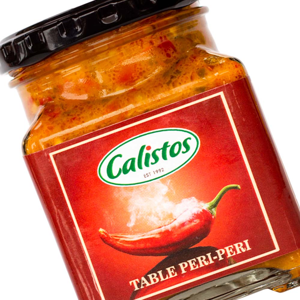 tableperiperi zoom sml Calisto’s Table Sauces - Table Peri-Peri - mild everyday peri-peri sauce for table use. Close up.